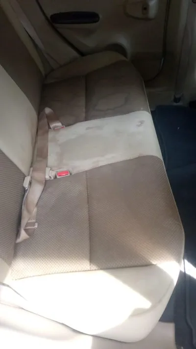Foto sebelum jasa cuci interior mobil di Jakarta - jok kotor dan bernoda